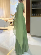 Effortless Elegance: Pleated Off-the-Shoulder Maxi Dress with a Fluid, Flowing Silhouette