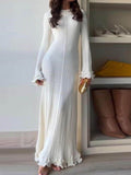 Elegant Knit Maxi Dress with Rolled Hem, Round Neck and Trumpet Sleeves