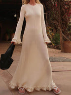 Elegant Knit Maxi Dress with Rolled Hem, Round Neck and Trumpet Sleeves
