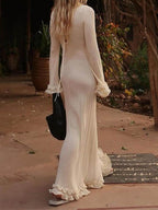 Elegant Knit Maxi Dress with Rolled Hem, Round Neck and Trumpet Sleeves