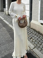 Elegant Knit Maxi Dress with Rolled Hem, Round Neck and Trumpet Sleeves
